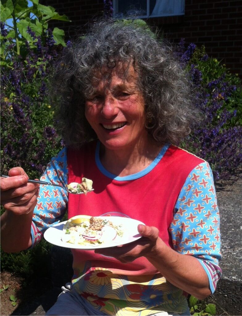 Shirley enjoying salmon on lemony coleslaw on her front porch.