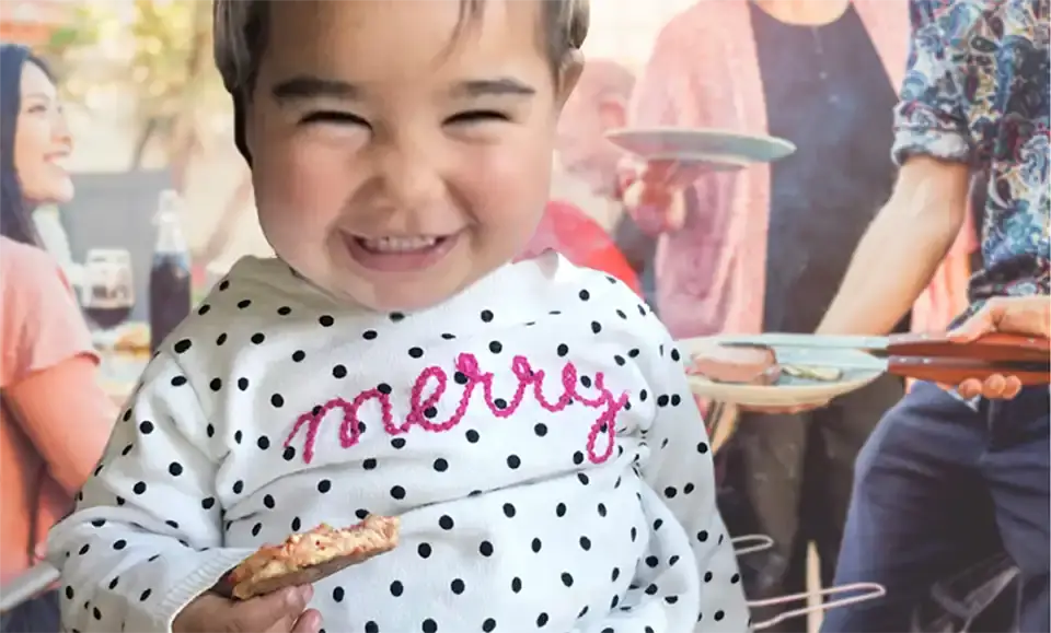 Young girl eating salmon